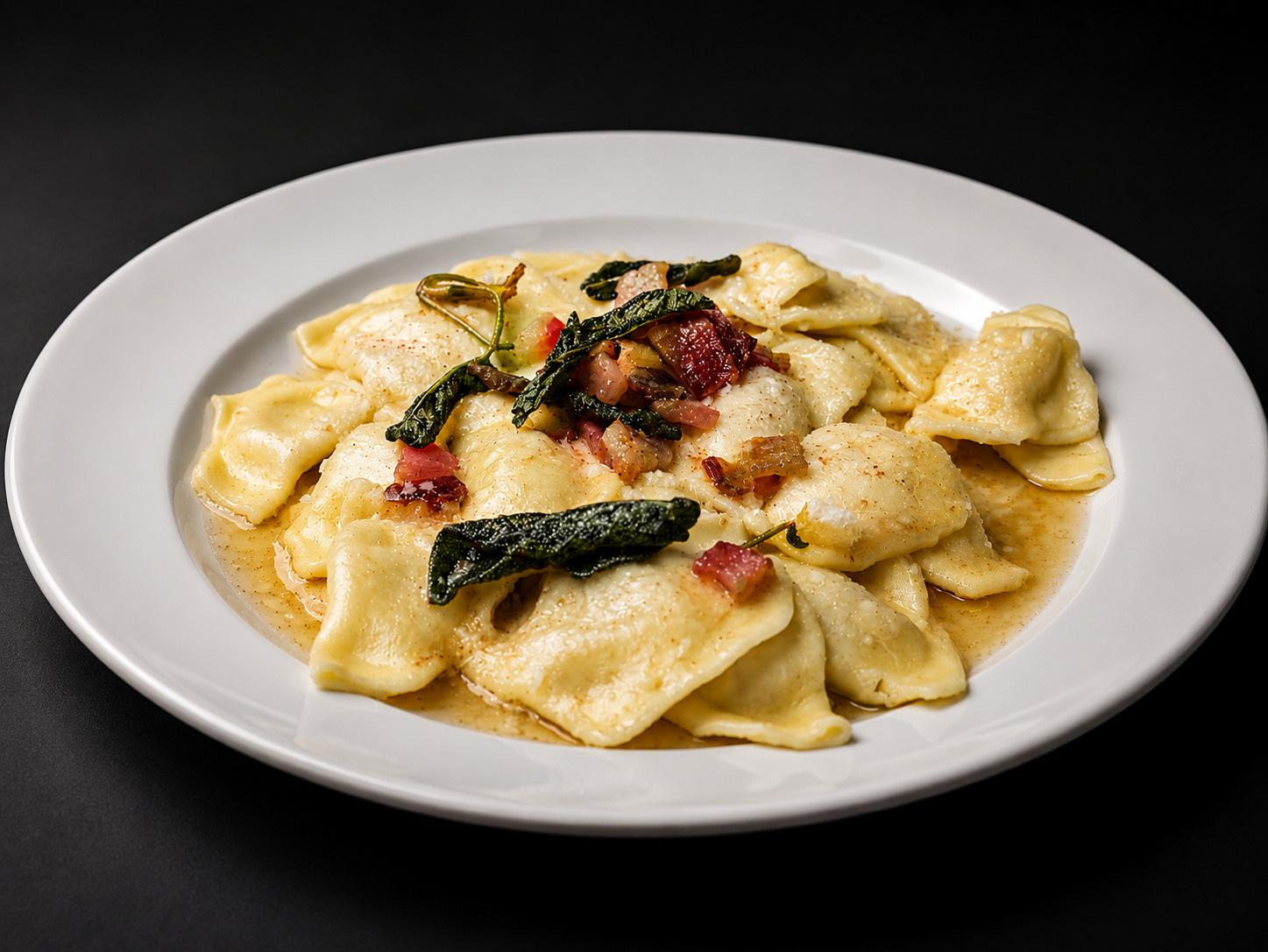 Casoncelli alla Bergamasca Piatto tradizionale di casoncelli alla bergamasca artigianali serviti al Ristorante del Parco